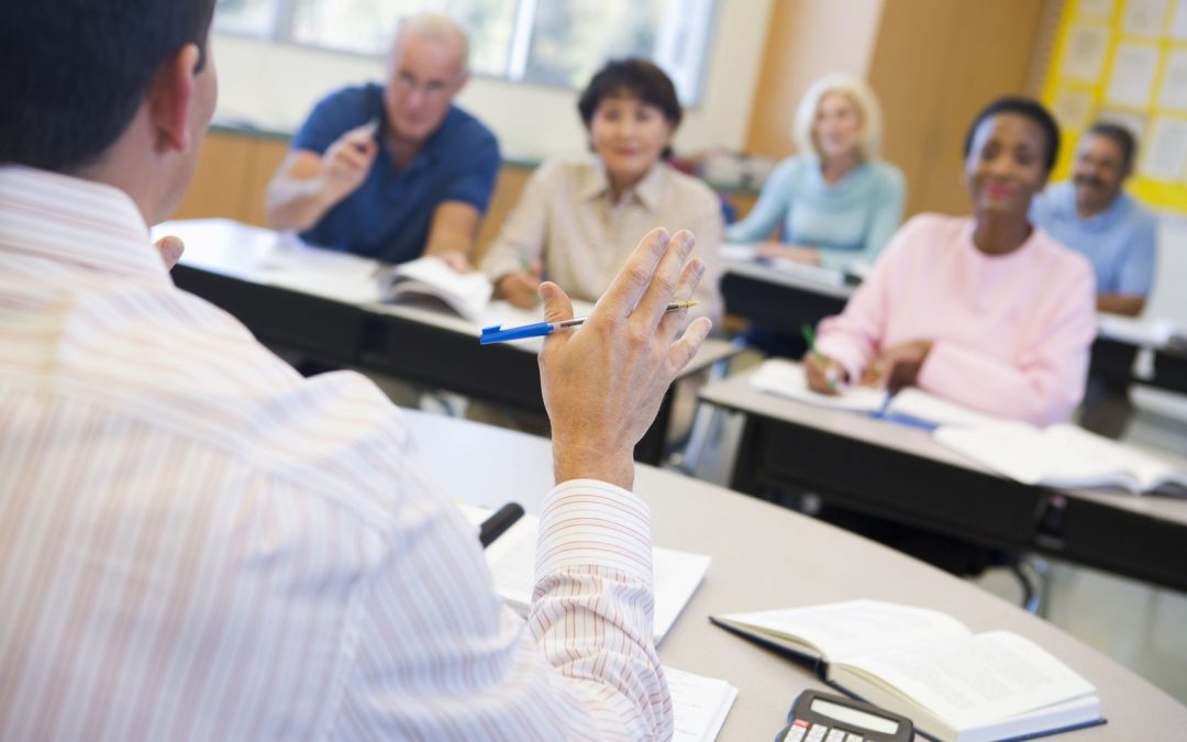 A teacher in a classroom.