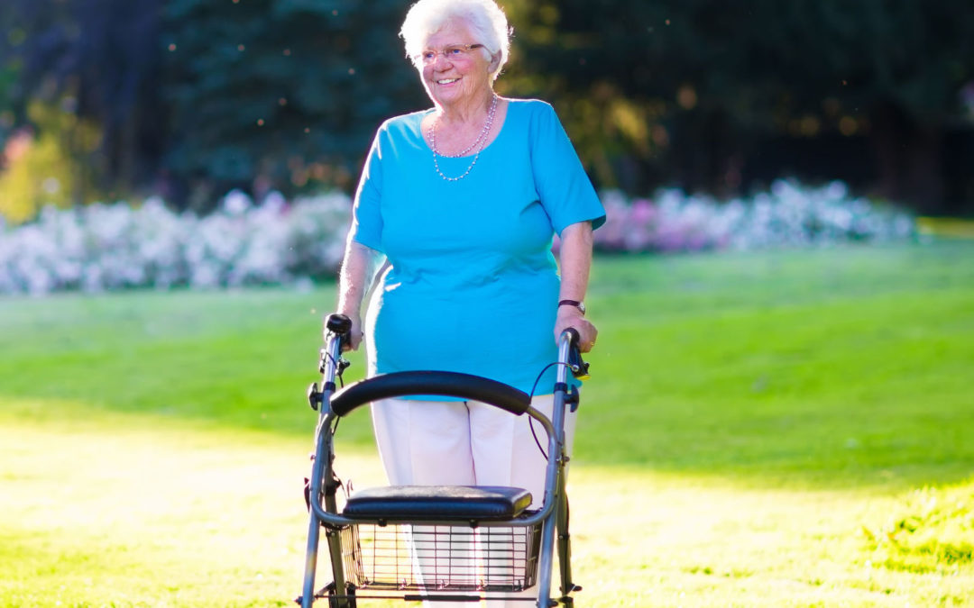 happy senior lady with a walking disability enjoying a walk in sun